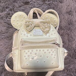 Disney Pearl-Studded mint green Backpack with Bow and Ears.